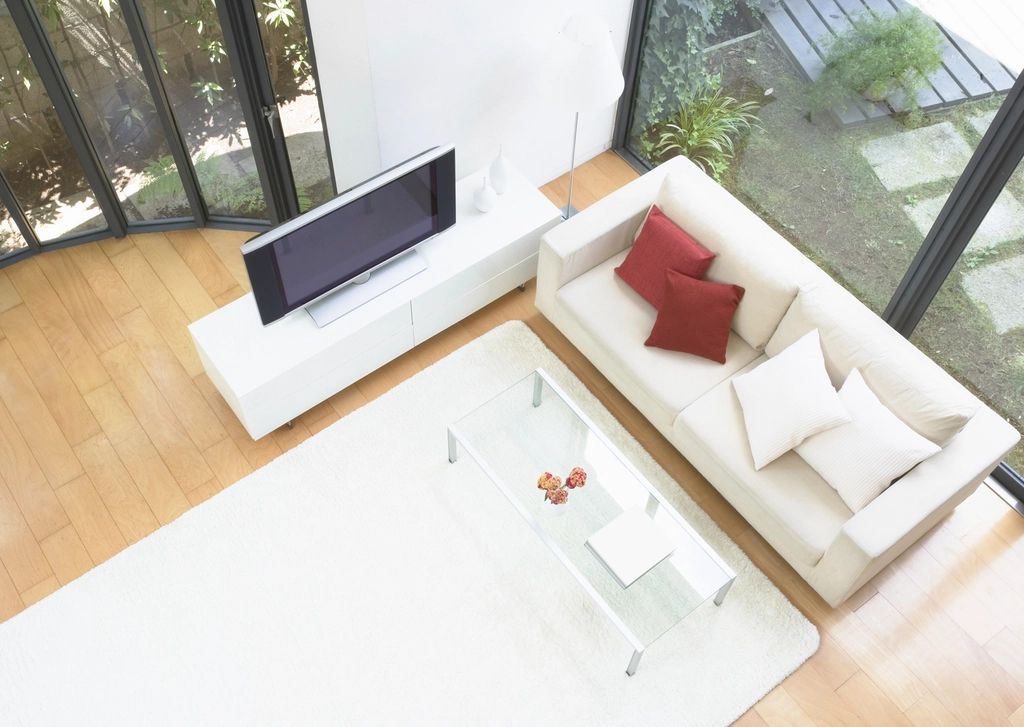 A suite sitting room with a sofa and armchairs